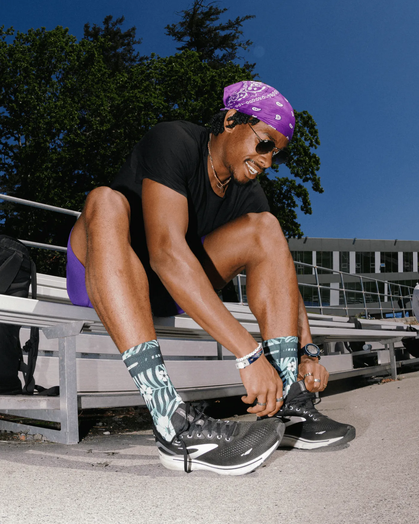 Athlete tying shoes in Outway socks